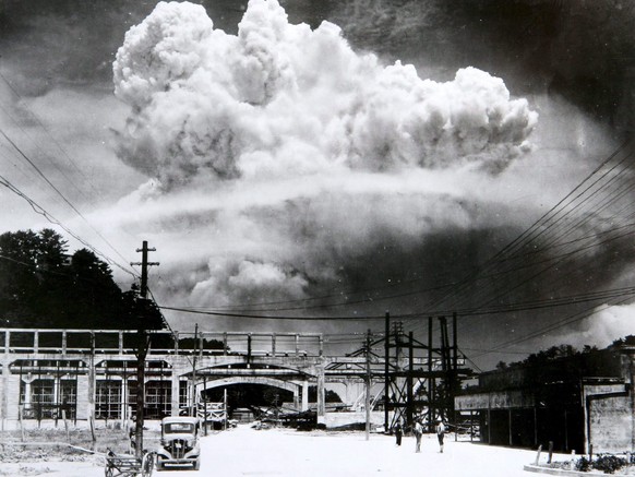 epa04867687 (FILE) A handout photo made available by the Nagasaki Atomic Bomb Museum shows a view of the mushroom cloud photographed from the ground of the 09 August 1945 atomic bombing of Nagasaki, J ...