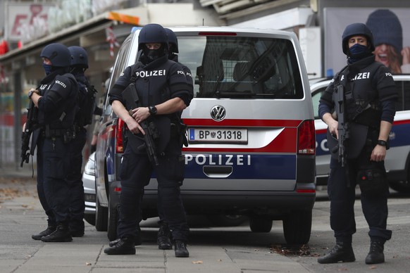 Police officers guard the scene in Vienna, Austria, Tuesday, Nov. 3, 2020. Police in the Austrian capital said several shots were fired shortly after 8 p.m. local time on Monday, Nov. 2, in a lively s ...