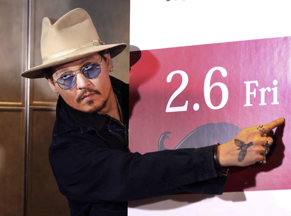 FILE - In this Jan. 28, 2015 file photo, U.S. actor Johnny Depp poses for photographers during a photo session prior to a press conference to promote his latest film "Mortdecai" in Tokyo. Au ...