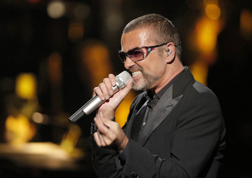 FILE - In this Sept. 9, 2012 file photo, British singer George Michael sings in concert to raise money for AIDS charity Sidaction, in Paris, France. A British coroner said Tuesday, March 7, 2017, that ...