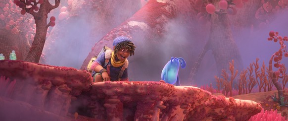 This image released by Disney shows Ethan, voiced by Jaboukie Young-White, left, with Splat, in a scene from the animated film &quot;Strange World.&quot; (Disney via AP)