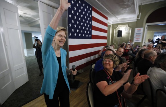 Democratic presidential candidate Sen. Elizabeth Warren enters the room to speak to local residents during a meet and greet, Sunday, May 26, 2019, in Ottumwa, Iowa.(AP Photo/Charlie Neibergall)