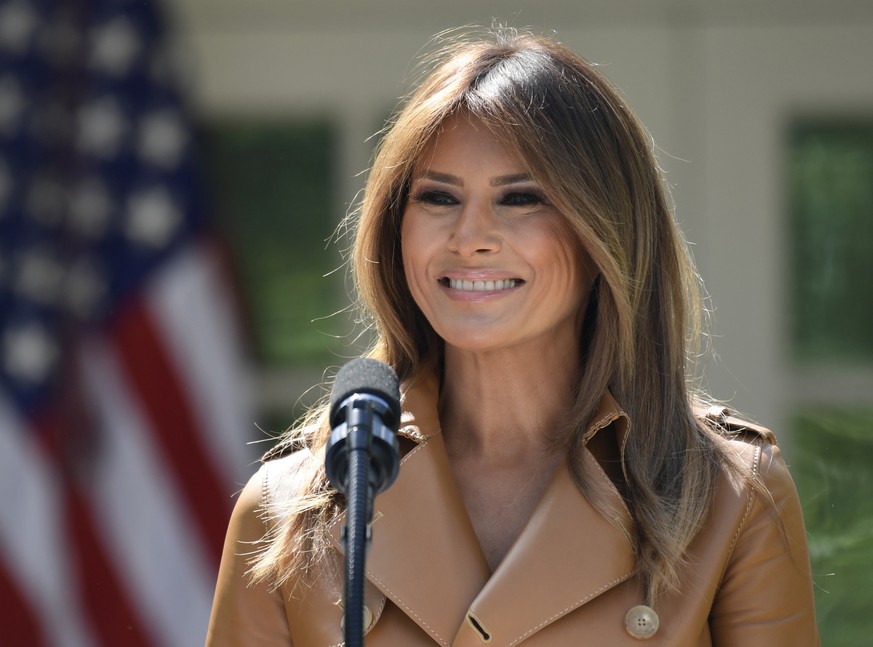 In this May 7, 2018 photo, First lady Melania Trump speaks on her initiatives during an event in the Rose Garden of the White House in Washington. The White House says Melania Trump is hospitalized af ...