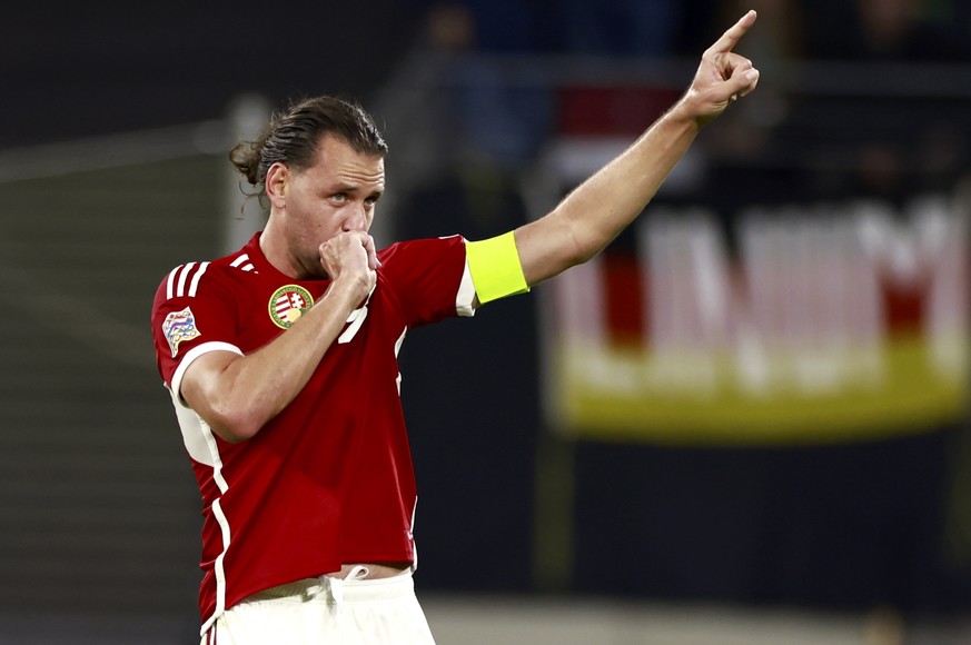 epa10202239 Adam Szalai of Hungary celebrate after scoring the 1-0 lead during the UEFA Nations League soccer match between Germany and Hungary in Leipzig, Germany, 23 September 2022. EPA/HANNIBAL HAN ...