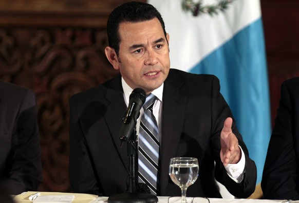 epa04997904 Guatemalan elected president Jimmy Morales speaks during a press conference in Guatemala City, Guatemala, 26 October 2015. Former comedian Jimmy Morales won the presidential runoff in a hi ...