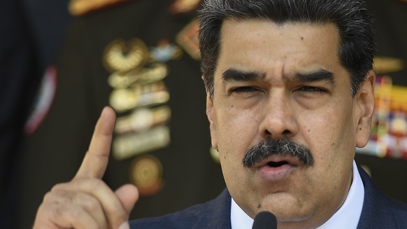 FILE - In this March 12, 2020, file photo, Venezuelan President Nicolas Maduro speaks at a press conference at the Miraflores Presidential Palace in Caracas, Venezuela. The Trump administration will a ...