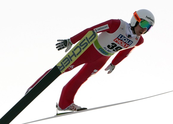 epa05183963 Simon Ammann of Switzerland is airborne during the Men&#039;s HS140 competition at the FIS Ski Jumping World Cup in Almaty, Kazakhstan, 27 February 2016. EPA/IGOR KOVALENKO