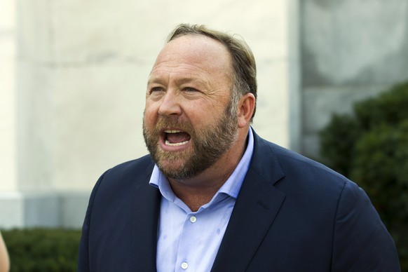 FILE - In this Sept. 5, 2018, file photo, Infowars host and conspiracy theorist Alex Jones speaks outside of the Dirksen building on Capitol Hill in Washington. A Connecticut judge has found Jones lia ...