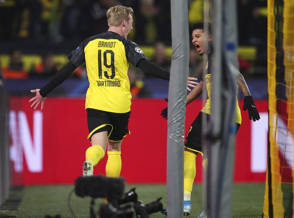 epa07975176 Dortmund&#039;s Julian Brandt (L) celebrates after scoring the 2-2 goal during the UEFA Champions League group F soccer match between Borussia Dortmund and Inter Milan in Dortmund, Germany ...