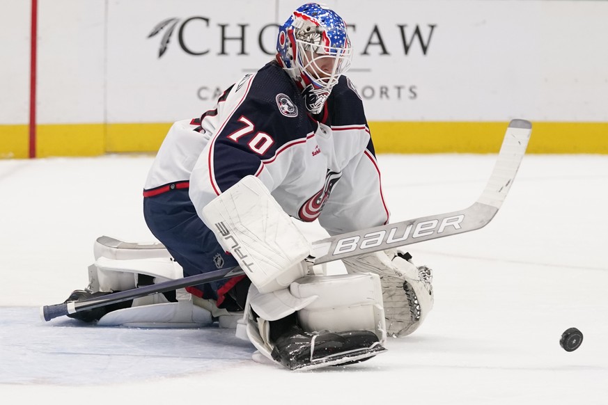 Columbus Blue Jackets goaltender Joonas Korpisalo watches the puck during the first period of the team&#039;s NHL hockey game against the Dallas Stars in Dallas, Saturday, Feb. 18, 2023. (AP Photo/LM  ...