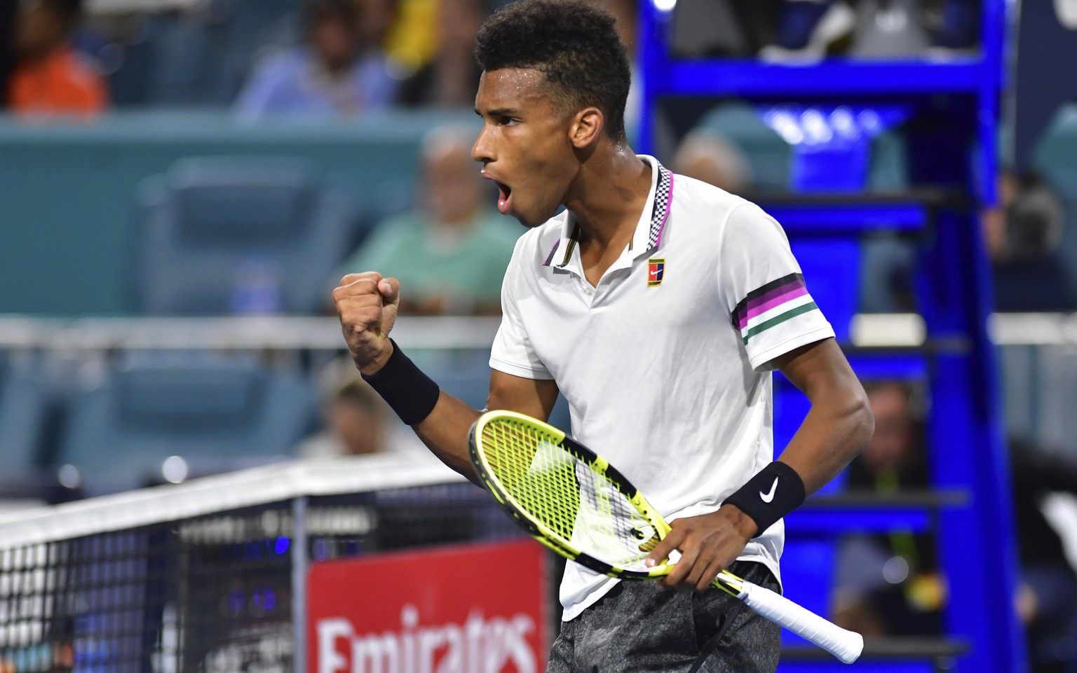 Felix Auger-Aliassime, of Canada, celebrates a point against Borna Coric, of Croatia, during the quarterfinals of the Miami Open tennis tournament Wednesday, March 27, 2019, in Miami Gardens, Fla. (AP ...