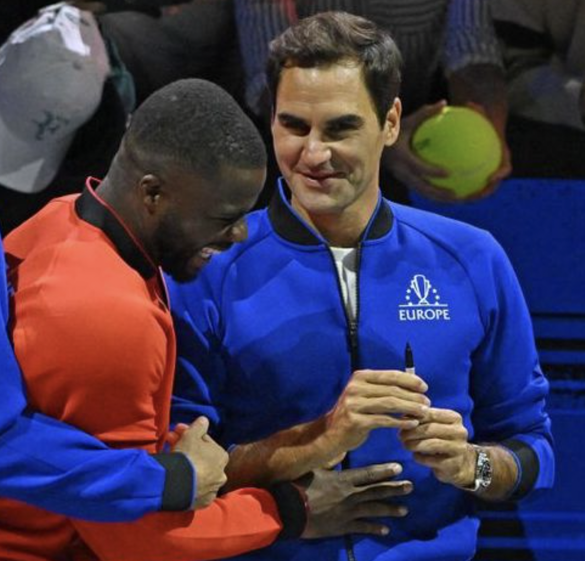 Frances Tiafoe et Roger Federer.