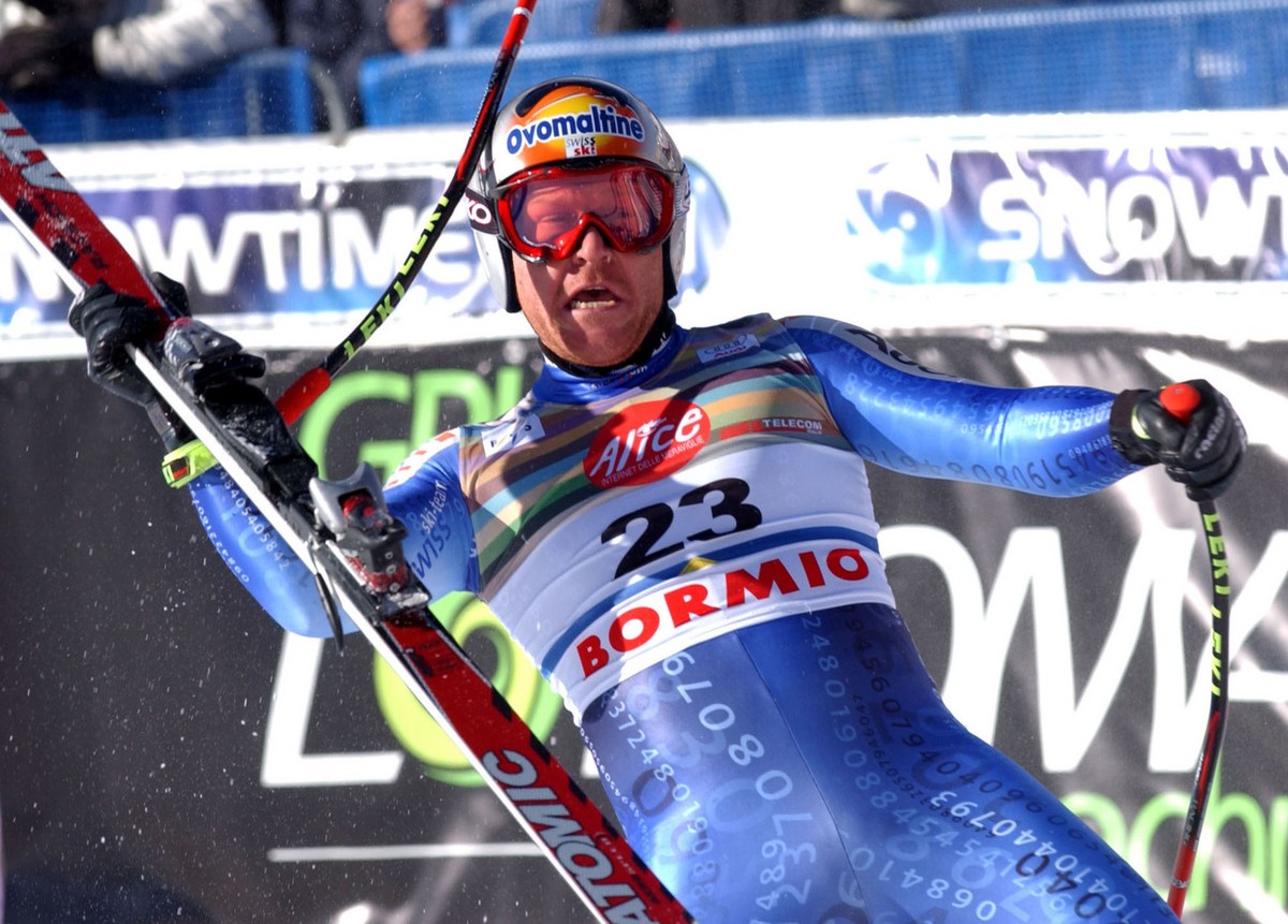 Swiss Didier Cuche celebrates at finish line after taking fifth place at the World Cup men&amp;#039;s downhill in Bormio, Italy, Saturday, Jan. 11, 2003. (AP Photo/Armando Trovati)