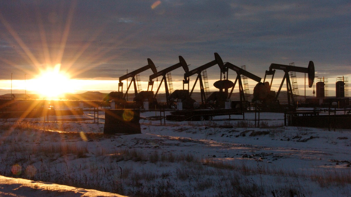 FILE - This Jan. 14, 2015 file photo shows oil pump jacks in McKenzie County in western North Dakota. President Joe Biden shut down oil and gas lease sales from the nation's vast public lands and ...