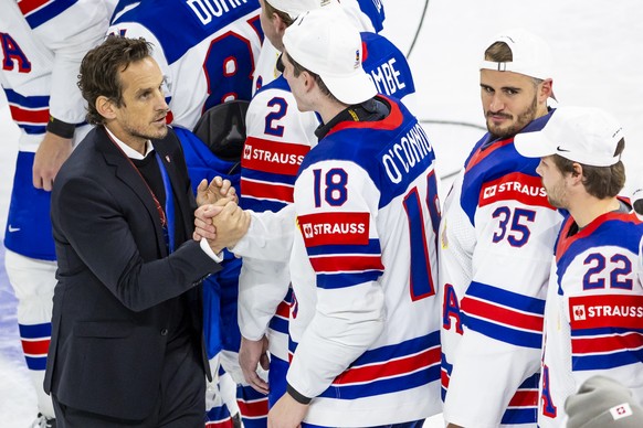 Patrick Fischer, head coach of Switzerland national ice hockey team reacts after the victory of the team USA during the gold medal game between Switzerland and USA at the IIHF 2025 World Championship, ...