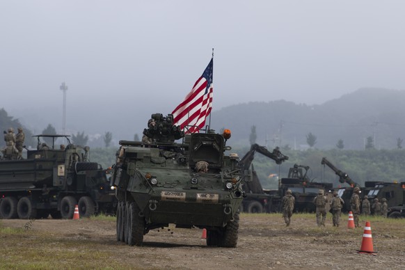 epa12325516 US soldiers from the 11th Engineer Battalion with the 2nd Infantry Combined Division conduct a combined wet gap crossing exercise with the 7th Engineer Brigade, 7th Corps of the South Kore ...