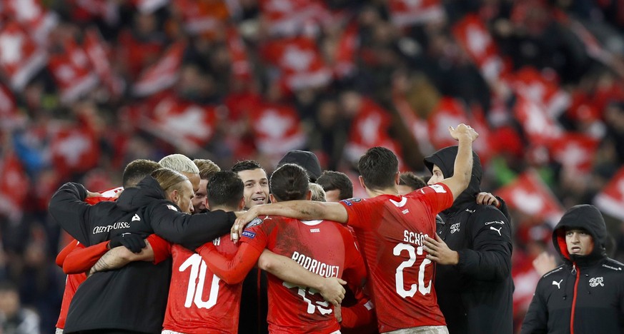 epa06325344 Switzerland&#039;s players celebrate the qualification for the 2018 FIFA World Cup Russia after winning against Northern Ireland, during the 2018 Fifa World Cup play-offs second leg soccer ...