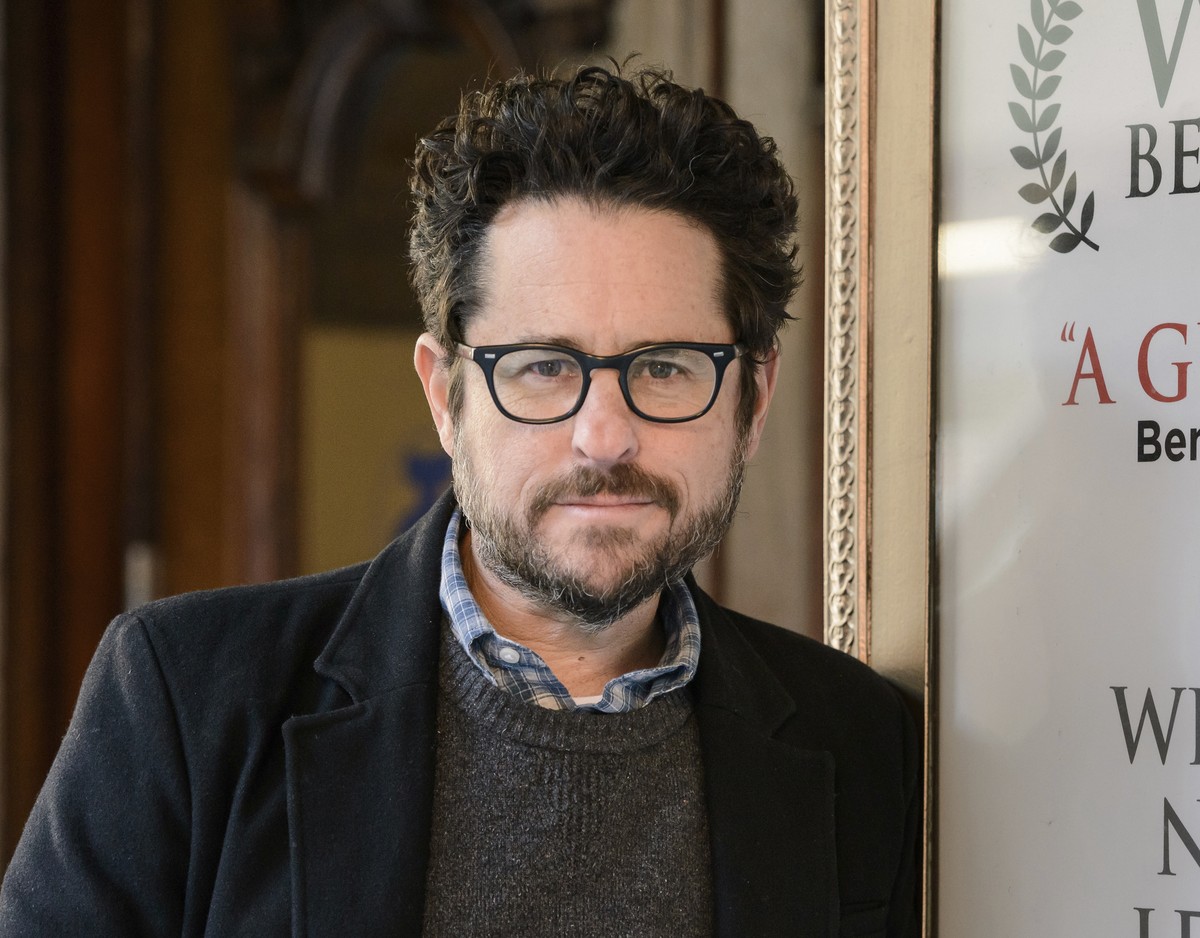 FILE - In this March 2, 2017 file photo, director-producer J.J. Abrams poses for a portrait to promote "The Play That Goes Wrong" at the Lyceum Theatre in New York. Abrams says he will use u ...
