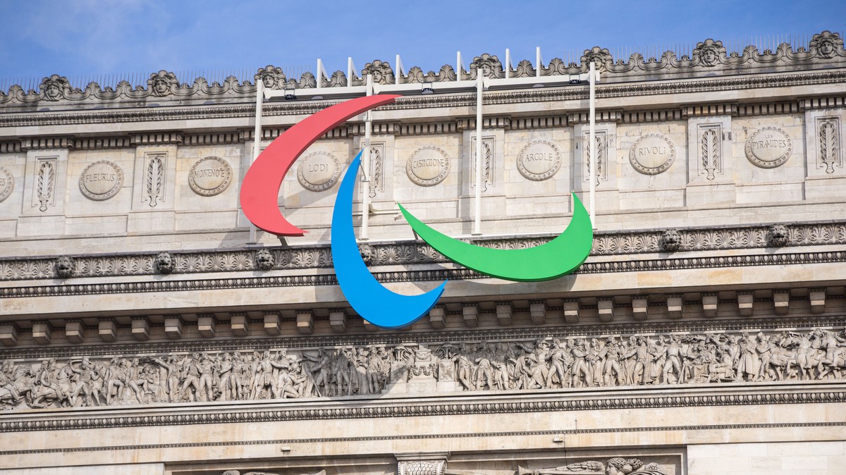 epa11442764 The Paris 2024 Paralympic Games Agitos is installed on the 'Arc de Triomphe' at the Champs-Elysees in Paris, France, 28 June 2024. The Paris 2024 Paralympic Games will run from 2 ...