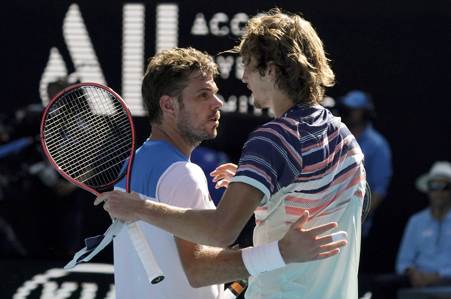 Germany&#039;s Alexander Zverev, right, is congratulated by Switzerland&#039;s Stan Wawrinka after winning their quarterfinal match at the Australian Open tennis championship in Melbourne, Australia,  ...