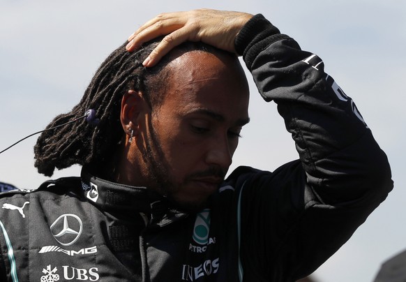 epa09570473 British Formula One driver Lewis Hamilton of Mercedes-AMG Petronas reacts on the grid before the Formula One Grand Prix of Mexico at the Autodromo Hermanos Rodriguez in Mexico City, Mexico ...