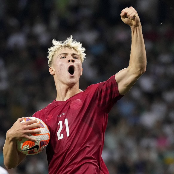 Denmark&#039;s Rasmus Hojlund celebrates after scoring against Slovenia during the Euro 2024 group H qualifying soccer match between Slovenia and Denmark at Stozice stadium in Ljubljana, Slovenia, Mon ...