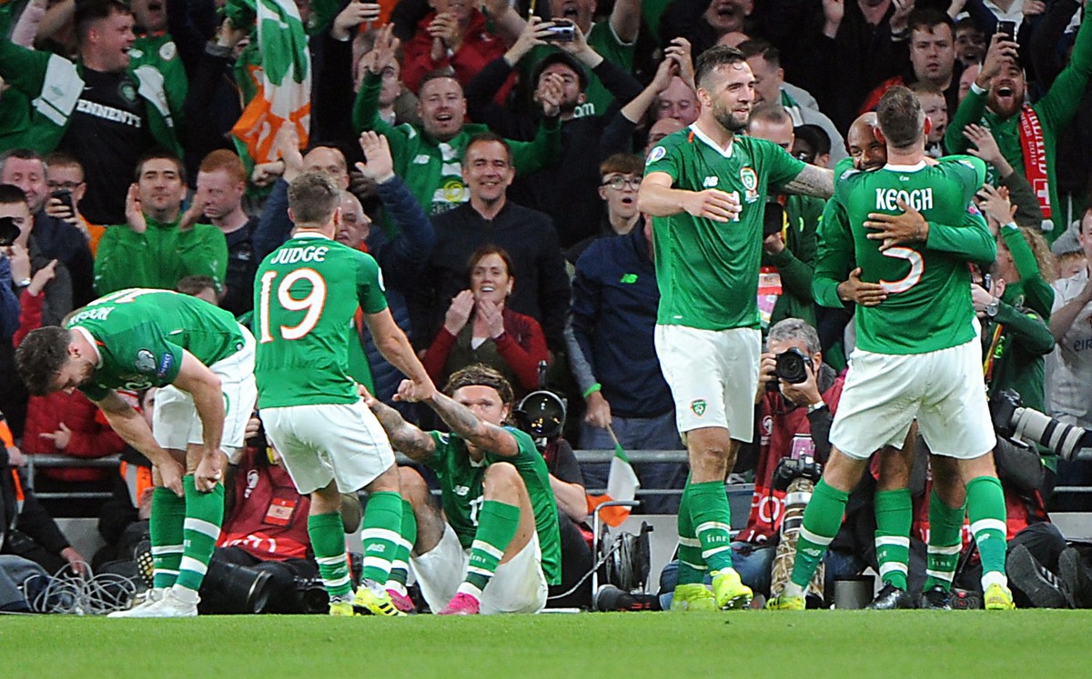epa07820983 Ireland's David McGoldrick (R, back) celebrates with teammates scoring during the UEFA Euro 2020 qualifying Group D soccer match between Ireland and Switzerland at the Aviva stadium i ...