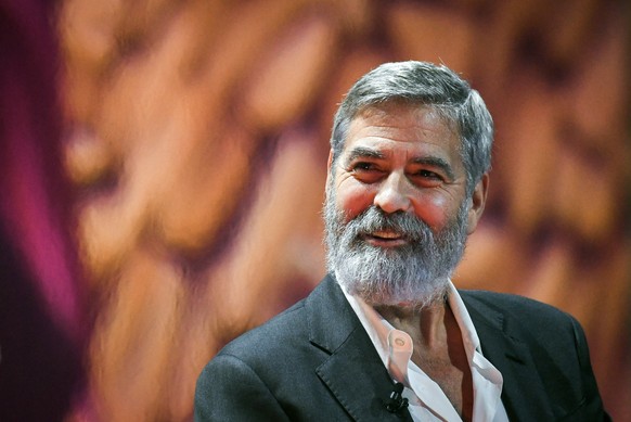 epa09167190 (FILE) - George Clooney, Oscar winning actor and filmaker, businessman and human rights activist, speaks at the Nordic Business Forum in Helsinki, Finland, 10 October 2019 (reissued 29 Apr ...