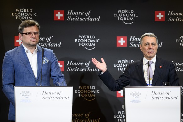 epa09973020 Ignazio Cassis (R) President of the Swiss Confederation speaks next to with Dmytro Kuleba (L) Minister of Foreign Affairs of Ukraine during a press conference on the upcoming conference &# ...