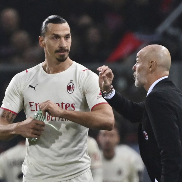 AC Milan&#039;s Stefano Pioli gives instructions to Zlatan Ibrahimovic during the Italian Serie A soccer match between Bologna and AC Milan at Renato Dall&#039;Ara stadium in Bologna, Italy, Saturday, ...