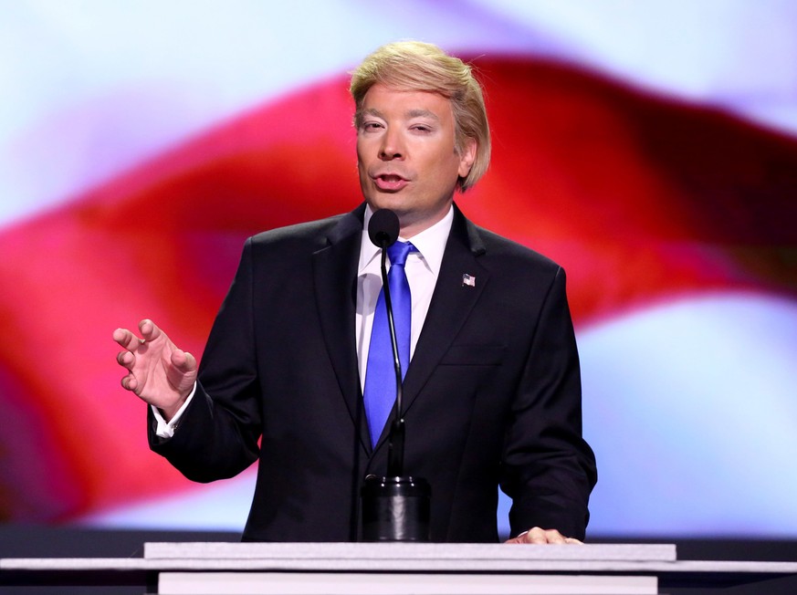 In this July 19, 2016 photo released by NBC, Jimmy Fallon impersonates Donald Trump on &quot;The Tonight Show Starring Jimmy Fallon,&quot; in New York. In every election year since 1992, the Republica ...