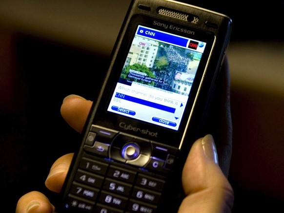 A Sony Ericsson mobile phone is displayed at a press conference in Stockholm, Thursday 23 November 2006. Sweden's LM Ericsson predicted Thursday that mobile television broadcasts will reach the g ...