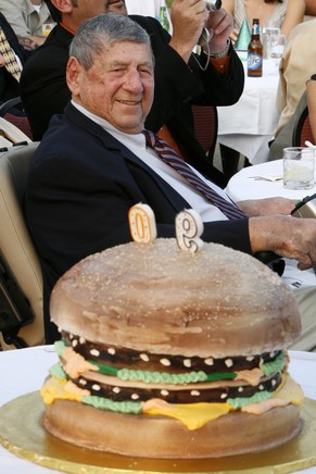 FILE - In this Aug. 21, 2008, file photo, Big Mac creator Michael "Jim" Delligatti sits behind a Big Mac birthday cake at his 90th birthday party in Canonsburg, Pa. Delligatti, the Pittsburg ...