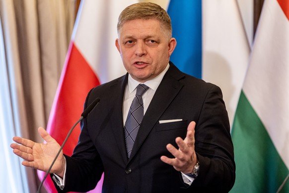 epa11184397 Slovak Prime Minister Robert Fico attends a press conference during the meeting of the Visegrad Group (V4) Prime Ministers in Prague, Czech Republic, 27 February 2023. EPA/MARTIN DIVISEK
