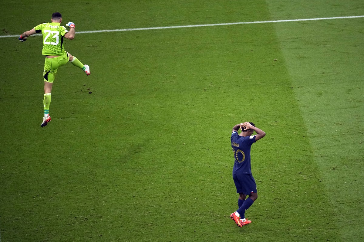 France's Kingsley Coman reacts after missing a penalty during a shootout at the end of the World Cup final soccer match between Argentina and France at the Lusail Stadium in Lusail, Qatar, Sunday ...