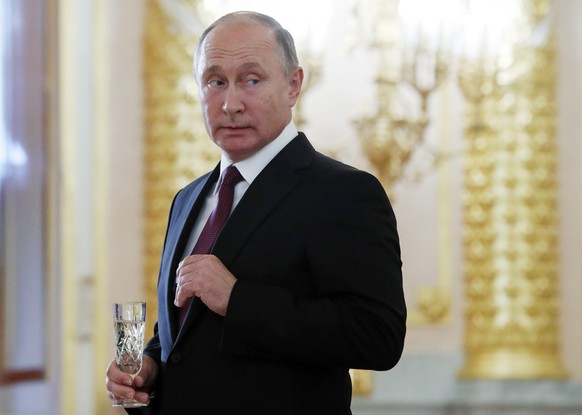 Russian President Vladimir Putin attends a ceremony to receive diplomatic credentials from newly appointed foreign ambassadors at the Kremlin in Moscow, Russia, Thursday, Oct. 11, 2018. (Sergei Karpuk ...