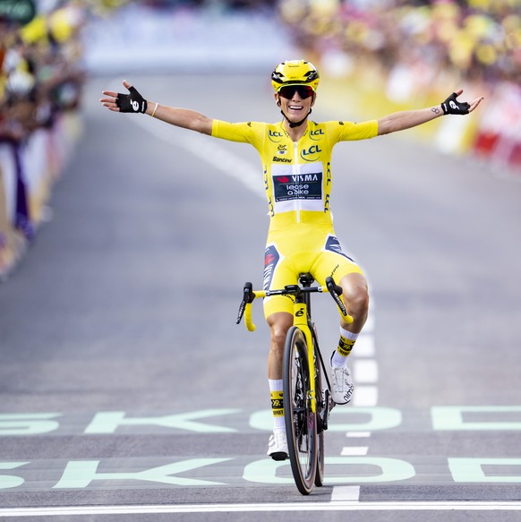 The winner of the Tour de France Femmes Pauline Ferrand-Prevot from France of team Visma - Lease a Bike celebrates as she crosses the finish line to win the 9th stage of the 4th edition of the Women&# ...