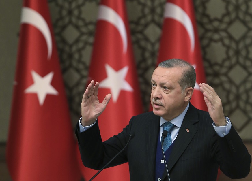 Turkey&#039;s President Recep Tayyip Erdogan, gestures as he delivers a speech at an event in Ankara, Turkey, Tuesday, Dec. 12, 2017. Leaders and high-ranking officials of Muslim countries will meet W ...