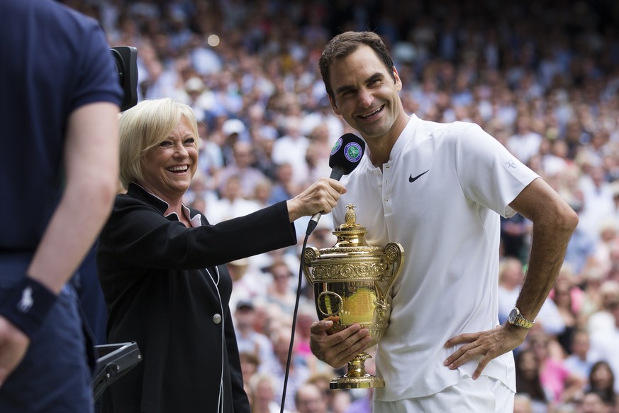 Roger Federer of Switzerland speaks during an interview after winning the men&#039;s final match against Marin Cilic of Croatia during the Wimbledon Championships at the All England Lawn Tennis Club,  ...