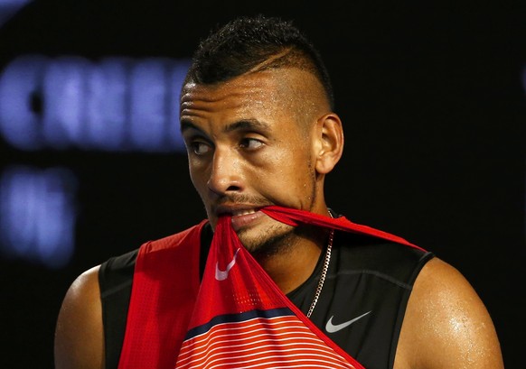 Australia&#039;s Nick Kyrgios bites his shirt during his third round match against Czech Republic&#039;s Tomas Berdych at the Australian Open tennis tournament at Melbourne Park, Australia, January 22 ...