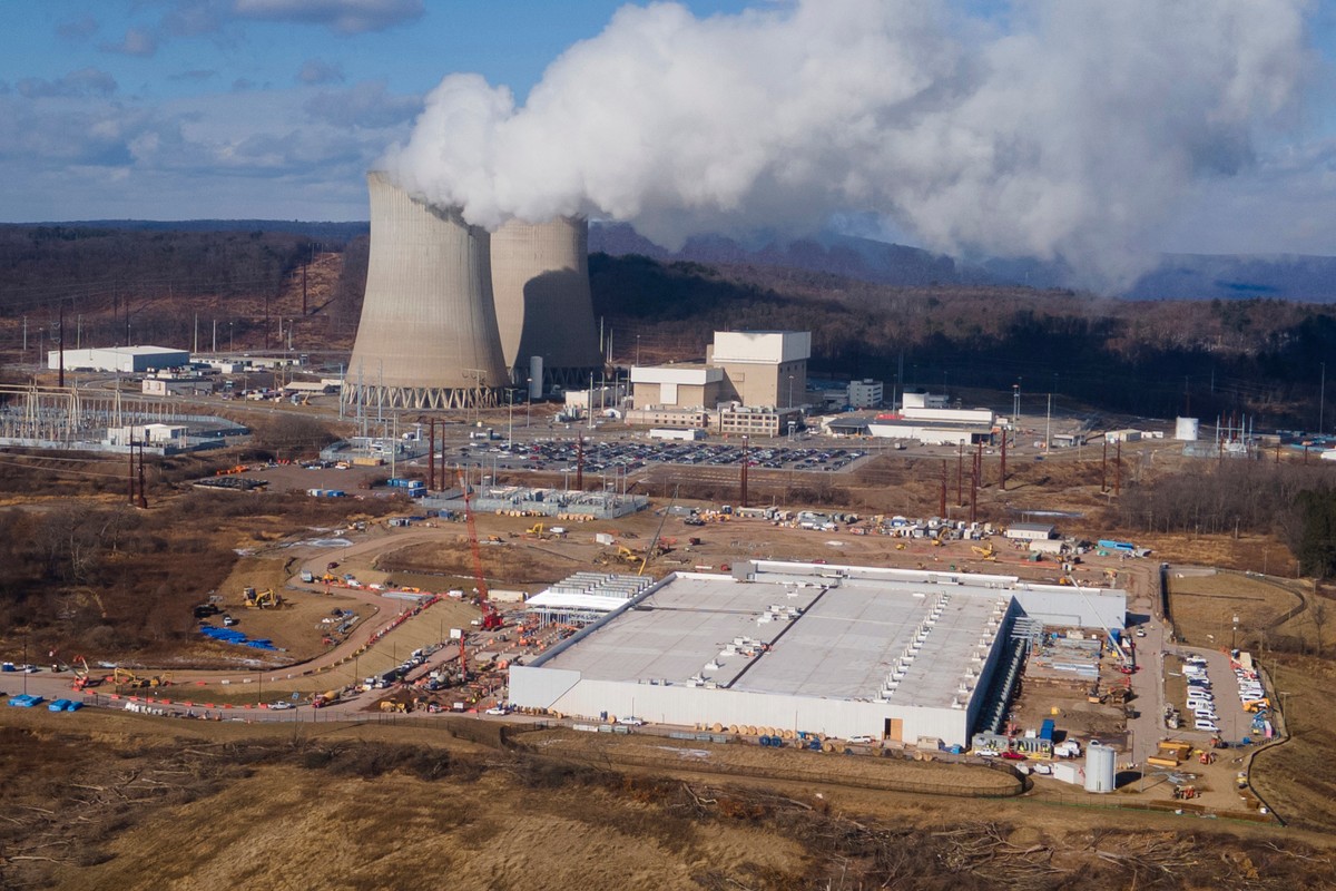FILE - A data center owned by Amazon Web Services, front right, is under construction next to the Susquehanna nuclear power plant in Berwick, Pa., Jan. 14, 2025. (AP Photo/Ted Shaffrey, File)
Energy P ...