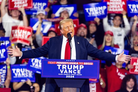 epaselect epa11651635 Former US president and current Republican presidential nominee Donald Trump holds a campaign rally in Reading, Pennsylvania, USA, 09 October 2024. Trump will then head west to c ...