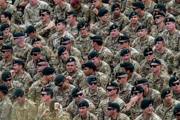epa12168566 Soldiers await US President Donald Trump who will speak at Fort Bragg to celebrate the US Army&#039;s 250th anniversary at Pike Field at Fort Bragg, North Carolina, USA, 10 June 2025. Fort ...