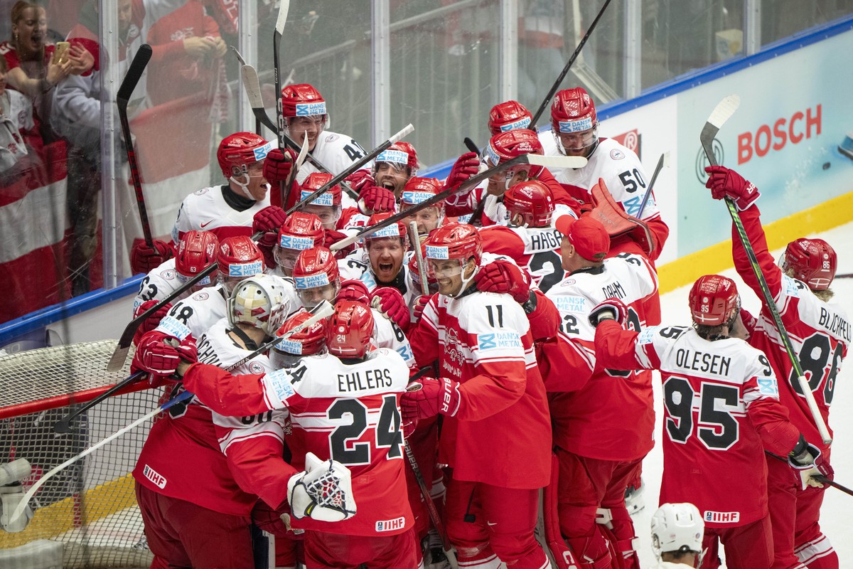 Denmark players celebrate after their 2-1 win in a quarterfinal game between Canada and Denmark at the hockey world championships, Thursday, May 22, 2025, in Herning, Denmark. (Bo Amstrup/Ritzau Scanp ...