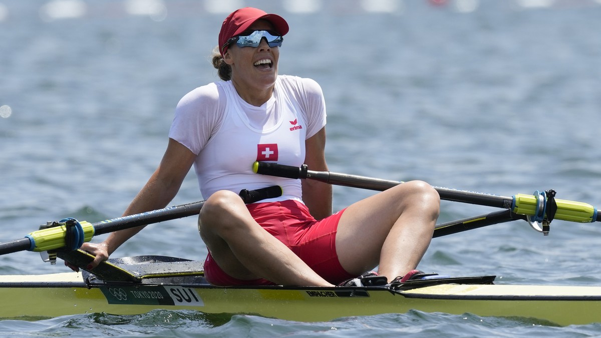 Jeannine Gmelin of Switzerland reacts after competing in the women's rowing single sculls semifinal at the 2020 Summer Olympics, Thursday, July 29, 2021, in Tokyo, Japan. (AP Photo/Darron Cumming ...