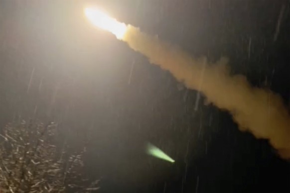 This image was made from a video posted by a Telegram channel affiliated with the Ukrainian military on Tuesday, Nov. 19, 2024. The channel says it shows a U.S.-supplied ATACMS missile being fired fro ...