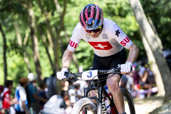 Mathias Flueckiger of Switzerland in action during the Men's Cross-country race at the 2024 Paris Summer Olympics in Paris, France, Monday, July 29, 2024. (KEYSTONE/Laurent Gillieron)