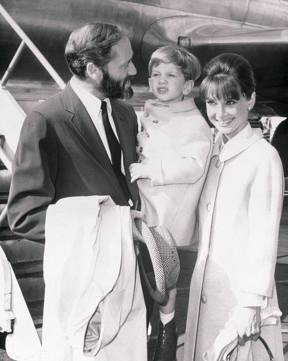 (Original Caption) Audrey Hepburn, who will star in the title role of the Warner Brothers motion picture production of My Fair Lady, arrives at New York International Airport via Swissair from Zurich, ...