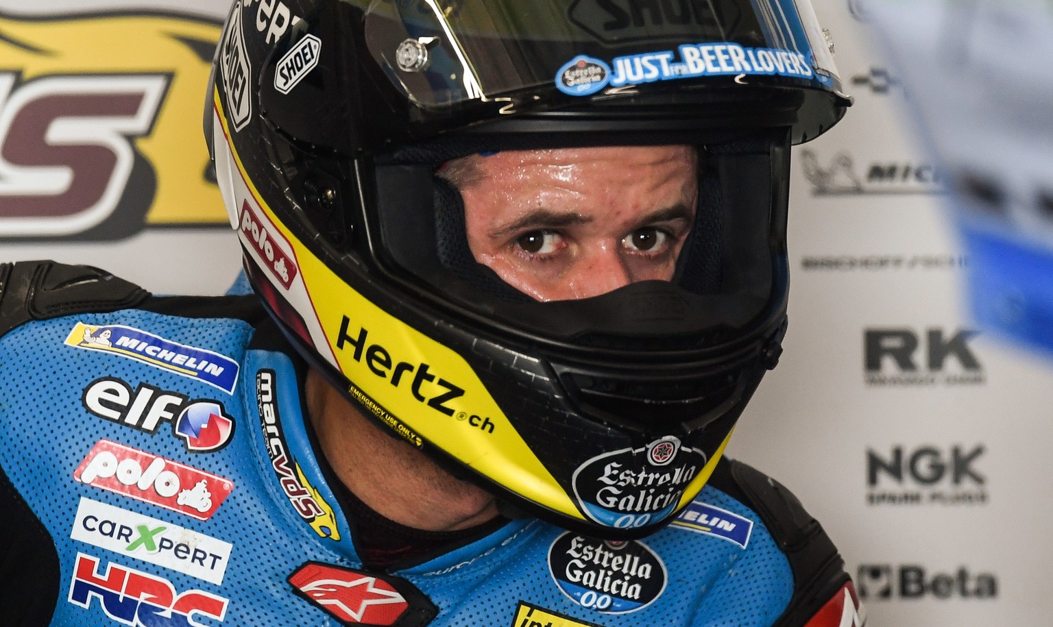 epa06887478 Swiss Moto GP rider Thomas Luethi of EG 0,0 Marc VDS in his team&#039;s box during the free practice session of the motorcycling Grand Prix of Germany at the Sachsenring racing circuit in  ...