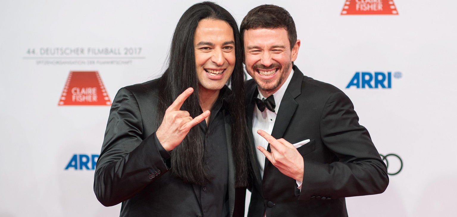 epa05739902 Actor Buelent Ceylan (L) and director Oliver Berben (R) arrive for the 44th German Film Ball at the Hotel Bayerischer Hof in Munich, Germany, 21 January 2017. EPA/LENNART PREISS